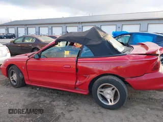 1998 Ford Mustang with VIN 1FAFP4442WF140251, listed as a IAAI auction lot 41230126 with 128,583 mi miles. Bid and sale history available at carsss.com. Image 14.
