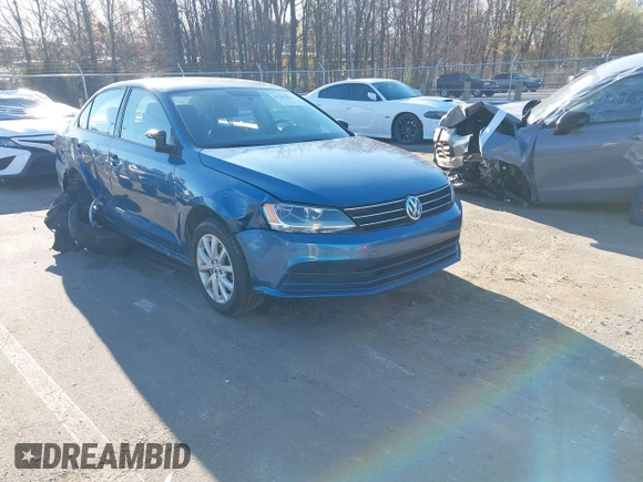 2015 Volkswagen Jetta SE z VIN 3VWD07AJ4FM285676, wystawiony jako IAAI lot #41787061 z przebiegiem 142 537 mil mil oraz . Historia ofert i sprzedaży dostępna na DreamBid. Obrazek 1.