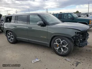 2023 Rivian R1S Launch Edition with VIN 7PDSGABL6PN022754, listed as a Copart auction lot 76849534 with 1,576 mi miles and Salvage Title. Bid and sale history available at carsss.com. Image 4.