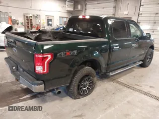 2015 Ford F-150 XLT with VIN 1FTEW1EP1FFB23876, listed as a IAAI auction lot 42049616 with 175,655 mi miles. Bid and sale history available at carsss.com. Image 4.