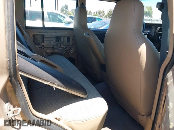 1999 Jeep Cherokee SE with VIN 1J4FF28S4XL592788, listed as a IAAI auction lot 42560002 with 189,258 mi miles and . Bid and sale history available at DreamBid. Image 8.
