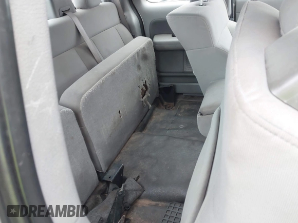 2007 Ford F-150 STX with VIN 1FTRX12W27FA79916, listed as a IAAI auction lot 41581837 with 209,945 mi miles and . Bid and sale history available at DreamBid. Image 8.
