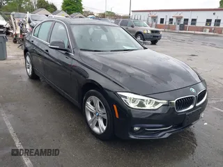2018 BMW 3 Series 330i xDrive with VIN WBA8D9G50JNU69376, listed as a IAAI auction lot 41971138 with 61,551 mi miles. Bid and sale history available at carsss.com. Image 1.
