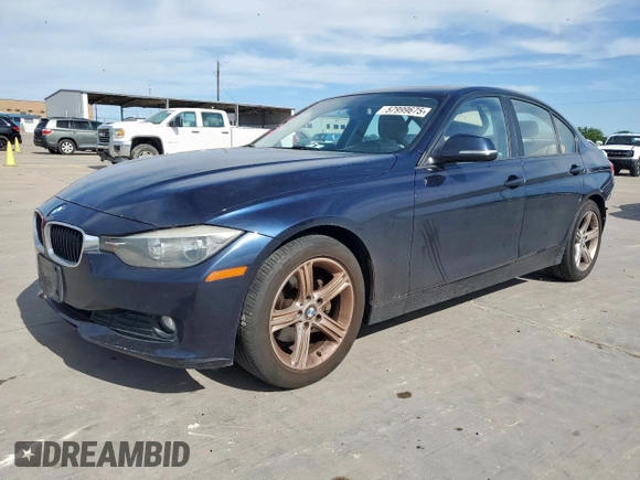 2015 BMW 3 Series 320i with VIN WBA3B1C58FK140327, listed as a Copart auction lot 57999675 with 124,437 mi miles and Salvage title. Bid and sale history available at DreamBid. Image 1.