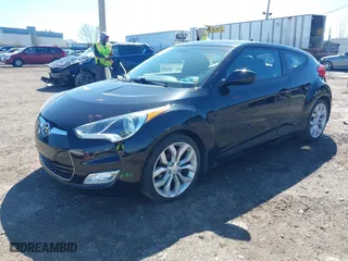 2013 Hyundai Veloster w/Black Int with VIN KMHTC6AD1DU111031, listed as a IAAI auction lot 41816195 with 108,832 mi miles. Bid and sale history available at carsss.com. Image 16.