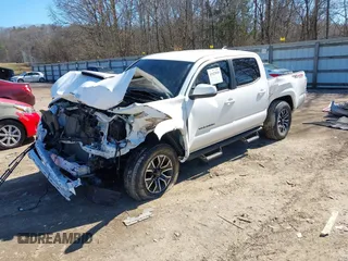 2022 Toyota Tacoma SR with VIN 3TMCZ5AN4NM470000, listed as a IAAI auction lot 41629818 with 78,138 mi miles and . Bid and sale history available at DreamBid. Image 2.