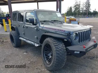 2021 Jeep Wrangler Unlimited Rubicon with VIN 1C4HJXFG9MW531858, listed as a IAAI auction lot 42001095 with 38,240 mi miles and . Bid and sale history available at DreamBid. Image 1.