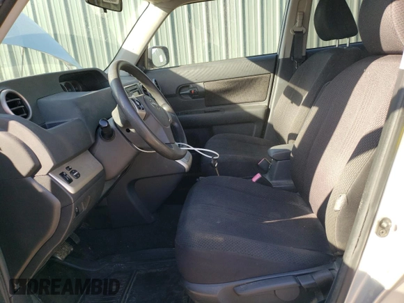 2010 Scion xB with VIN JTLZE4FEXA1098327, listed as a Copart auction lot 54733025 with 151,331 mi miles and Salvage Title. Bid and sale history available at DreamBid. Image 7.