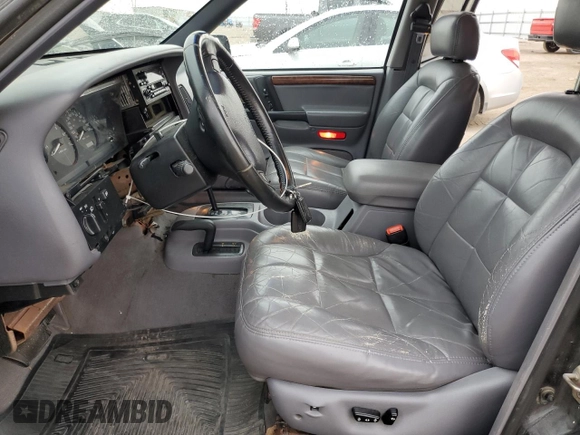 1997 Jeep Grand Cherokee Limited z VIN 1J4GZ78Y8VC586034, wystawiony jako Copart lot #58061705 z przebiegiem 244 355 mil mil oraz Czysty tytuł • Clean title. Historia ofert i sprzedaży dostępna na DreamBid. Obrazek 7.