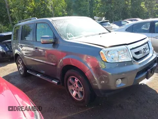 2010 Honda Pilot Touring z VIN 5FNYF4H98AB040972, wystawiony jako IAAI lot #42546704 z przebiegiem 120 469 mil mil oraz . Historia ofert i sprzedaży dostępna na DreamBid. Obrazek 1.