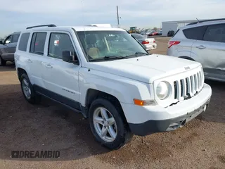 2015 Jeep Patriot Sport with VIN 1C4NJPBB2FD157427, listed as a IAAI auction lot 41819957 with 106,614 mi miles. Bid and sale history available at carsss.com. Image 1.