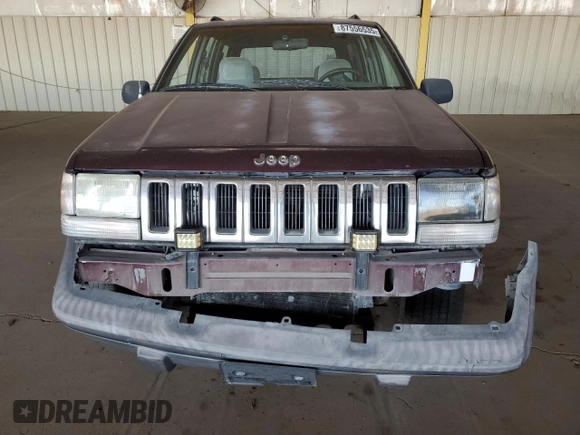 1995 Jeep Grand Cherokee Laredo with VIN 1J4GZ58S1SC704775, listed as a Copart auction lot 87556535 with 266,365 mi miles and Salvage title. Bid and sale history available at DreamBid. Image 5.