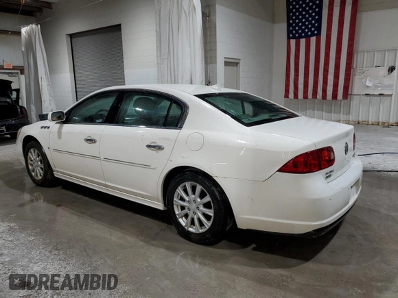 2010 Buick Lucerne CXL with VIN 1G4HC5EM8AU106608, listed as a Copart auction lot 49465595 with 98,789 mi miles and Salvage Title. Bid and sale history available at DreamBid. Image 2.
