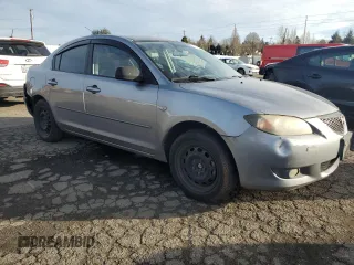 2005 Mazda 3 i with VIN JM1BK12F751242280, listed as a Copart auction lot 84316214 with 222,131 mi miles and Salvage Title. Bid and sale history available at DreamBid. Image 4.