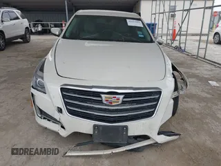 2014 Cadillac CTS RWD z VIN 1G6AP5SXXE0182114, wystawiony jako IAAI lot #42157993 z przebiegiem 132 507 mil mil oraz . Historia ofert i sprzedaży dostępna na DreamBid. Obrazek 13.