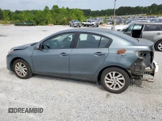 2012 Mazda 3 i Touring with VIN JM1BL1V71C1694546, listed as a Copart auction lot 55103025 with 148,810 mi miles and Salvage title. Bid and sale history available at DreamBid. Image 2.