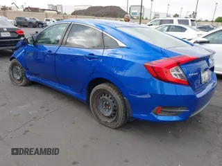 2018 Honda Civic LX with VIN 2HGFC2F51JH527351, listed as a IAAI auction lot 42071411 with 88,606 mi miles and . Bid and sale history available at DreamBid. Image 3.