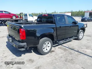 2021 Chevrolet Colorado 2WD LT z VIN 1GCGSCEN1M1131727, wystawiony jako IAAI lot #42181484 z przebiegiem 54 764 mil mil oraz . Historia ofert i sprzedaży dostępna na DreamBid. Obrazek 4.