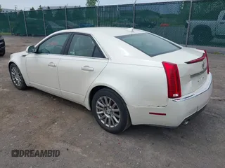 2009 Cadillac CTS RWD with VIN 1G6DF577290173180, listed as a IAAI auction lot 42376810 with 135,111 mi miles and . Bid and sale history available at DreamBid. Image 3.