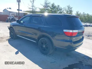 2013 Dodge Durango SXT with VIN 1C4RDJAG2DC530407, listed as a IAAI auction lot 41837441 with 133,375 mi miles and . Bid and sale history available at DreamBid. Image 3.