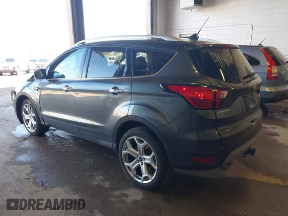 2019 Ford Escape Titanium with VIN 1FMCU9J95KUA19816, listed as a IAAI auction lot 41899819 with 71,760 mi miles and . Bid and sale history available at DreamBid. Image 3.