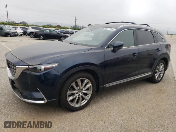 2017 Mazda CX-9 Grand Touring z VIN JM3TCADY3H0140573, wystawiony jako Copart lot #60513145 z przebiegiem 97 793 mil mil oraz Czysty tytuł • Clean title. Historia ofert i sprzedaży dostępna na DreamBid. Obrazek 1.
