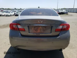 2013 Infiniti M with VIN JN1BY1AP2DM511973, listed as a Copart auction lot 55351815 with 126,888 mi miles and Salvage title. Bid and sale history available at DreamBid. Image 6.