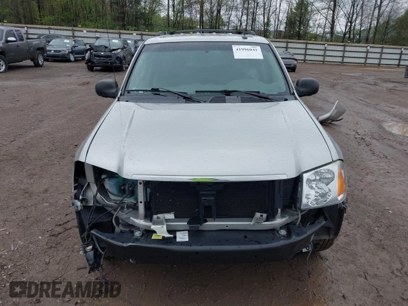 2005 GMC Envoy SLE z VIN 1GKDT13S752159660, wystawiony jako IAAI lot #41996041 z przebiegiem 133 948 mil mil oraz . Historia ofert i sprzedaży dostępna na DreamBid. Obrazek 6.