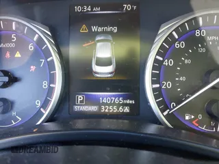 2014 Infiniti Q50 with VIN JN1BV7AP0EM682444, listed as a IAAI auction lot 41857312 with 140,765 mi miles. Bid and sale history available at carsss.com. Image 7.