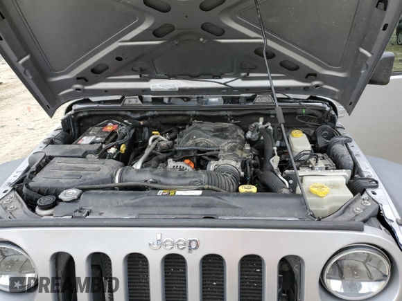 2015 Jeep Wrangler Unlimited Willys Wheeler with VIN 1C4BJWDG4FL723924, listed as a Copart auction lot 47145245 with 166,256 mi miles and Salvage Title. Bid and sale history available at DreamBid. Image 14.