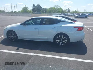 2016 Nissan Maxima SL with VIN 1N4AA6AP7GC440246, listed as a IAAI auction lot 42006715 with 146,154 mi miles and . Bid and sale history available at DreamBid. Image 14.