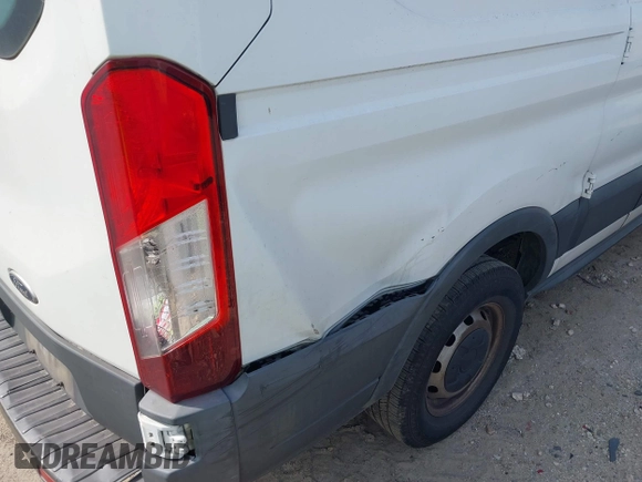 2016 Ford Transit Cargo with VIN 1FTYE1ZM0GKB06687, listed as a IAAI auction lot 42232871 with 330,423 mi miles and . Bid and sale history available at DreamBid. Image 6.