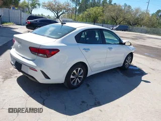 2023 Kia Rio S with VIN 3KPA24AD8PE554914, listed as a IAAI auction lot 41741938 with 24,224 mi miles. Bid and sale history available at carsss.com. Image 4.