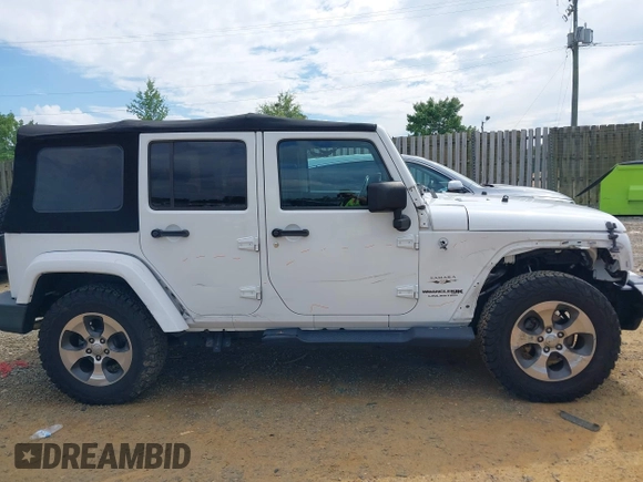 2018 Jeep Wrangler Unlimited Altitude with VIN 1C4HJWEGXJL870606, listed as a IAAI auction lot 42693031 with 92,735 mi miles and . Bid and sale history available at DreamBid. Image 14.