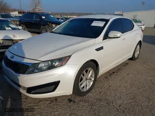 2011 Kia Optima LX with VIN KNAGM4A72B5057213, listed as a IAAI auction lot 41230459 with 1 mi miles. Bid and sale history available at carsss.com. Image 2.