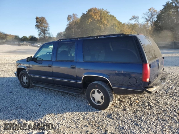 1999 Chevrolet Suburban with VIN 3GNEC16R3XG257322, listed as a Copart auction lot 77601224 with 196,923 mi miles and Salvage Title. Bid and sale history available at carsss.com. Image 2.