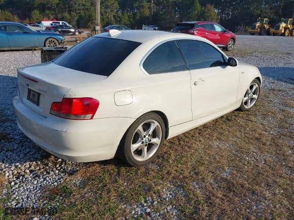2009 BMW 1 Series 128i SULEV with VIN WBAUP93579VF49106, listed as a IAAI auction lot 41443690 with 1 mi miles. Bid and sale history available at carsss.com. Image 4.