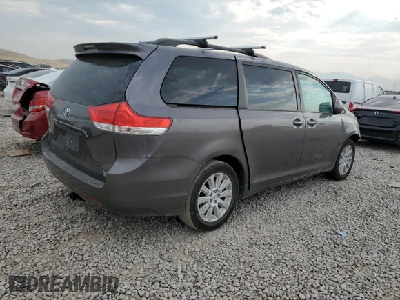 2012 Toyota Sienna XLE with VIN 5TDDK3DC7CS039221, listed as a Copart auction lot 64188804 with 180,811 mi miles and Salvage Title. Bid and sale history available at carsss.com. Image 3.