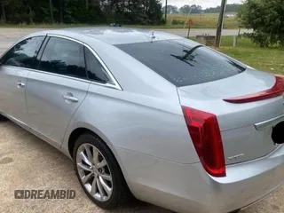 2013 Cadillac XTS Luxury z VIN 2G61P5S33D9171411, wystawiony jako Copart lot #59880945 z przebiegiem 268 029 mil mil oraz Czysty tytuł • Clean title. Historia ofert i sprzedaży dostępna na DreamBid. Obrazek 3.
