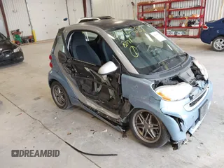 2011 Smart fortwo Pure z VIN WMEEJ3BA9BK432217, wystawiony jako IAAI lot #42145887 z przebiegiem 135 480 mil mil oraz . Historia ofert i sprzedaży dostępna na DreamBid. Obrazek 1.
