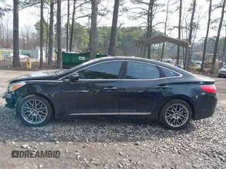 2014 Hyundai Azera Limited with VIN KMHFH4JG0EA368973, listed as a IAAI auction lot 41656545 with 108,631 mi miles and . Bid and sale history available at carsss.com. Image 14.