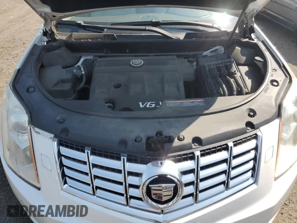 2014 Cadillac SRX Performance Collection with VIN 3GYFNCE38ES629600, listed as a Copart auction lot 61622725 with 86,183 mi miles and Salvage title. Bid and sale history available at DreamBid. Image 12.