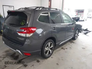 2021 Subaru Forester Touring with VIN JF2SKAXC8MH500831, listed as a IAAI auction lot 41564481 with 56,403 mi miles and . Bid and sale history available at DreamBid. Image 4.