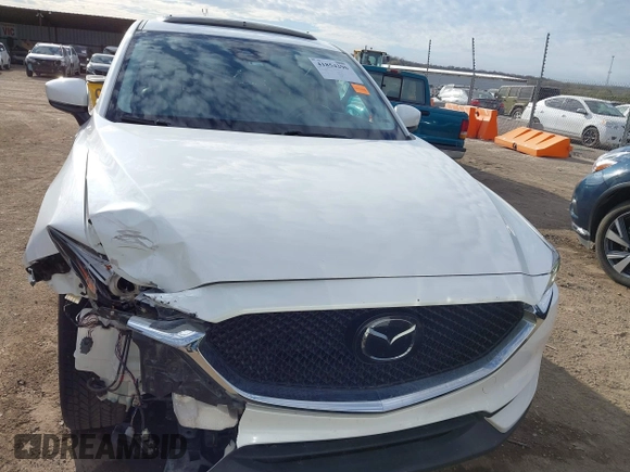 2019 Mazda CX-5 Grand Touring with VIN JM3KFBDM8K0518576, listed as a IAAI auction lot 41854296 with 88,706 mi miles and . Bid and sale history available at carsss.com. Image 12.