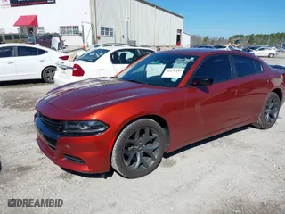 2020 Dodge Charger SXT with VIN 2C3CDXBG6LH249606, listed as a IAAI auction lot 41672492 with 93,580 mi miles. Bid and sale history available at carsss.com. Image 2.