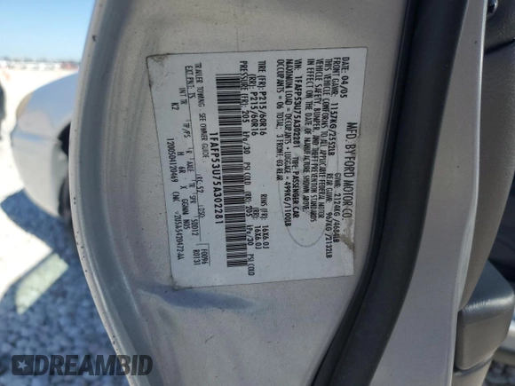 2005 Ford Taurus SE with VIN 1FAFP53U75A302281, listed as a Copart auction lot 53552465 with 100,413 mi miles and Salvage Title. Bid and sale history available at carsss.com. Image 13.