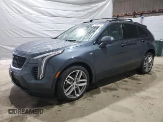 2019 Cadillac XT4 FWD Sport z VIN 1GYFZER45KF172859, wystawiony jako Copart lot #49805995 z przebiegiem 89 132 mil mil oraz Szkody całkowita. Historia ofert i sprzedaży dostępna na DreamBid. Obrazek 1.
