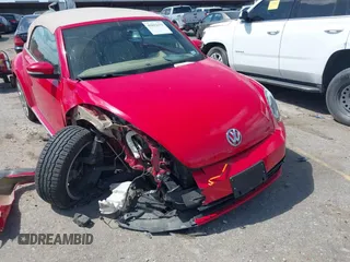 2015 Volkswagen Beetle 1.8T w/Tech with VIN 3VW517AT4FM803238, listed as a IAAI auction lot 41812373 with 42,369 mi miles and . Bid and sale history available at DreamBid. Image 6.
