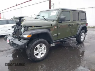 2021 Jeep Wrangler Unlimited Willys with VIN 1C4HJXDN5MW592125, listed as a IAAI auction lot 40821100 with 82,109 mi miles and . Bid and sale history available at DreamBid. Image 2.