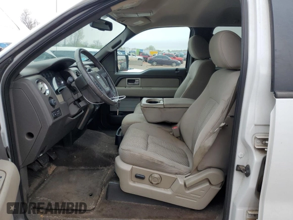 2010 Ford F-150 XL with VIN 1FTFW1CVXAFC29578, listed as a Copart auction lot 50214125 with 203,410 mi miles and Salvage Title. Bid and sale history available at carsss.com. Image 7.